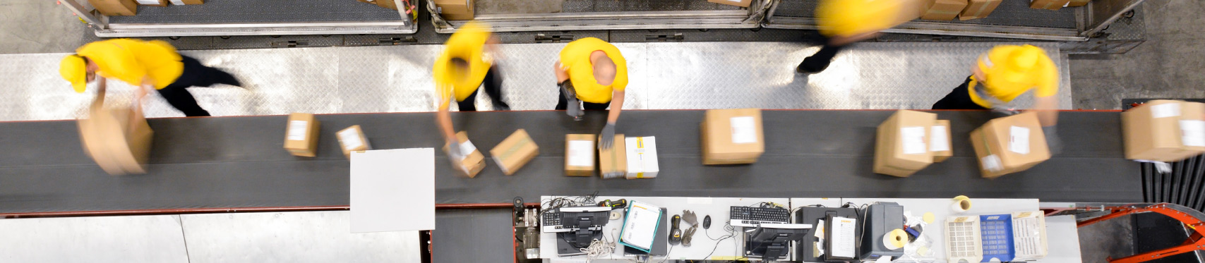 factory workers packing boxes
