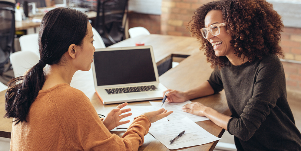 Women discussing Finance