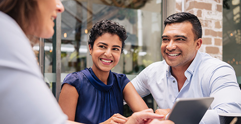 couple speaking to an advisor