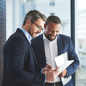 Business people looking at documents